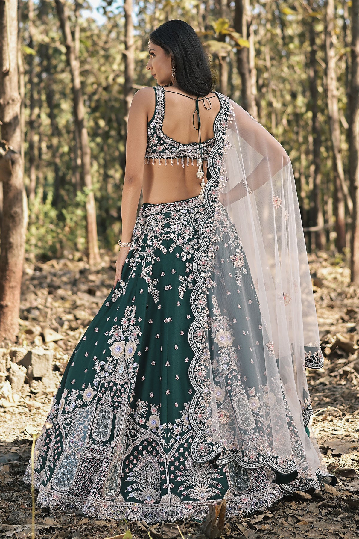 SERA VIII- dark emerald green lehenga set in raw silk