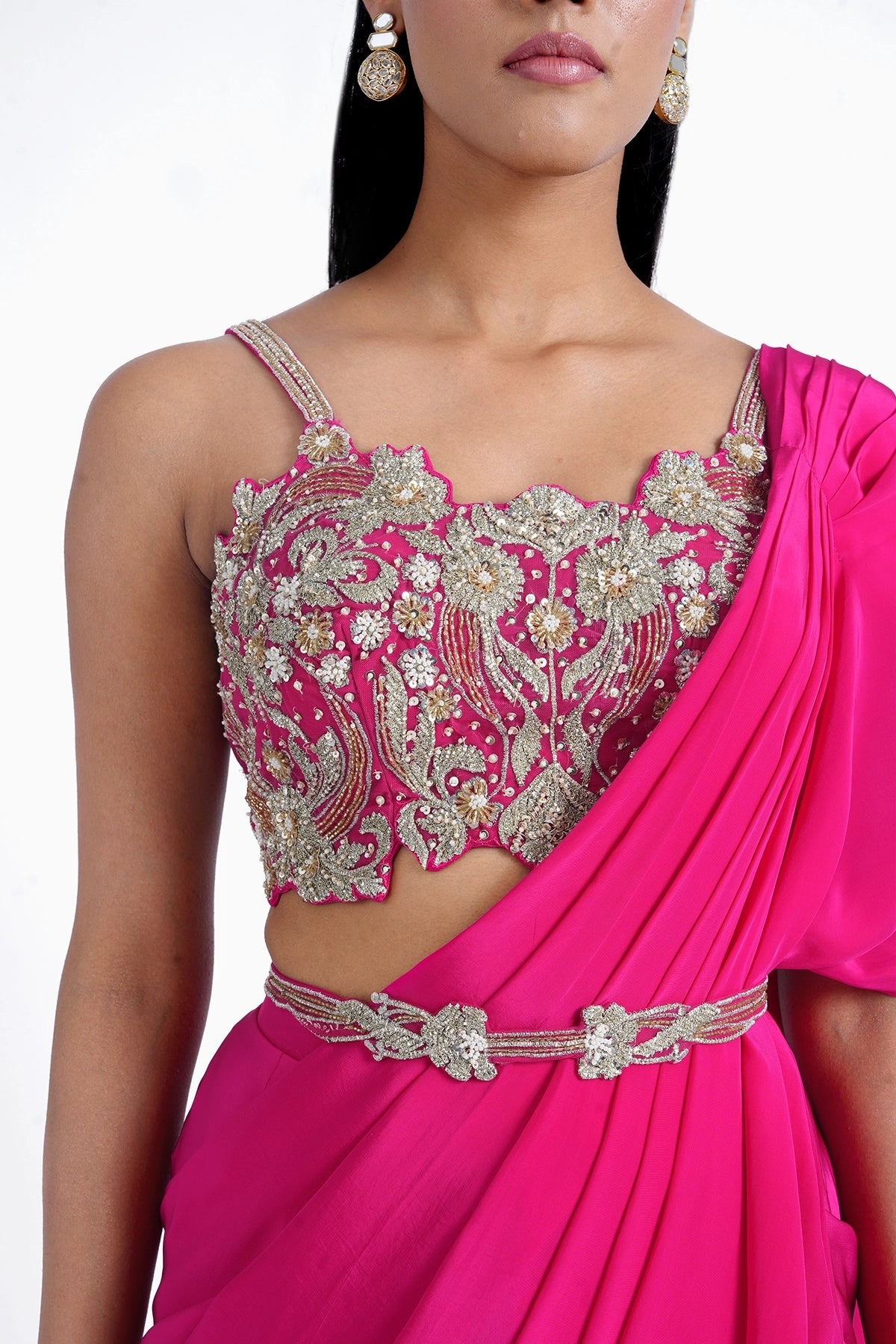 Rani pink pre-draped saree in crepe with spaghetti blouse and belt set
