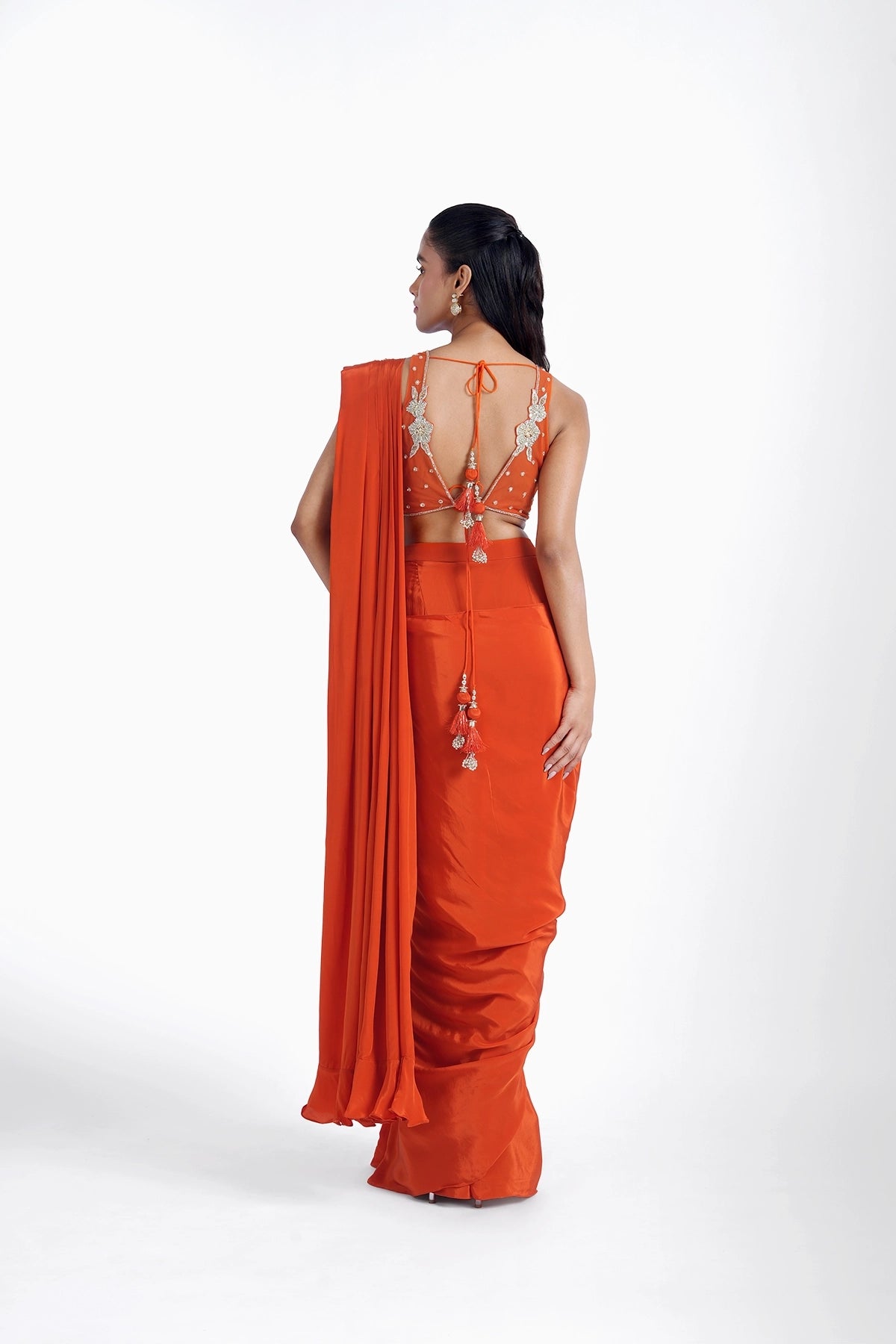 Orange pre-draped saree in crepe with katori style cutwork blouse set