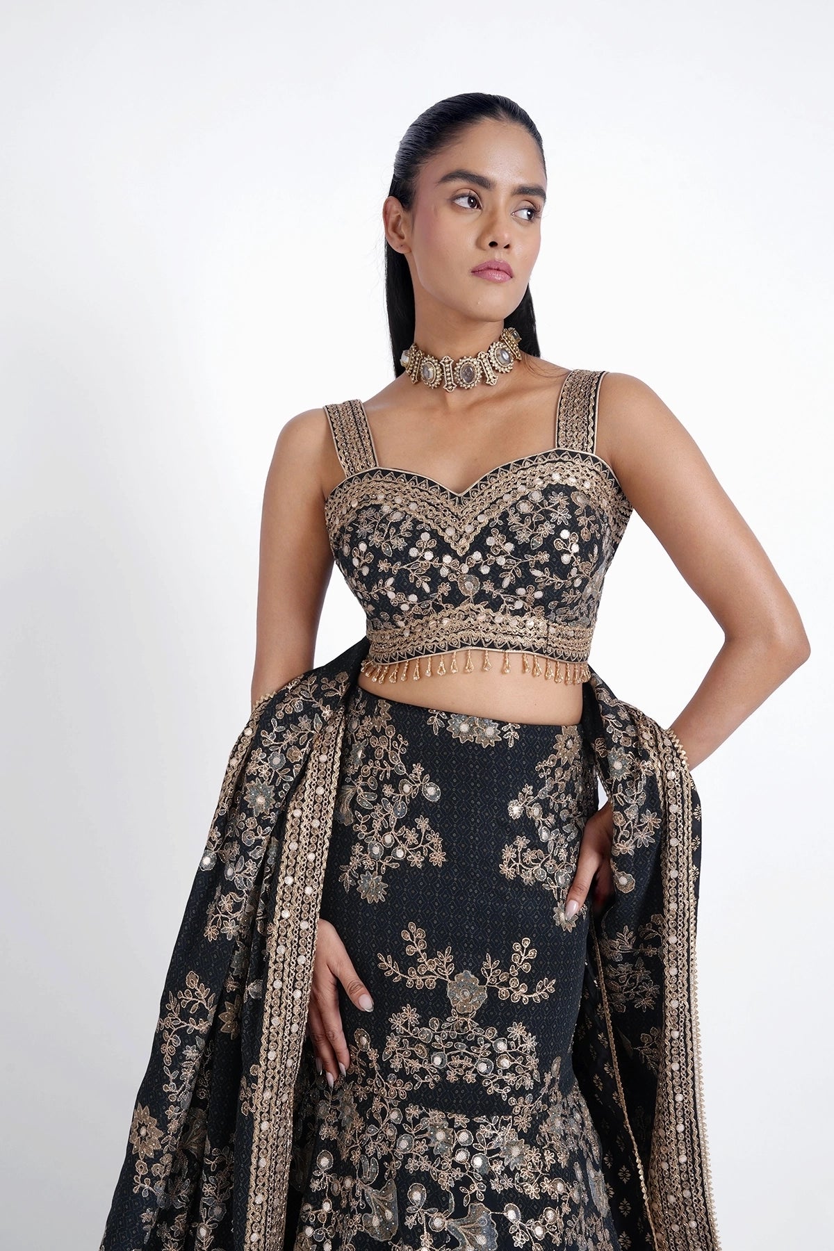 Dark blue fishcut printed lehenga with bird motif and gota work set